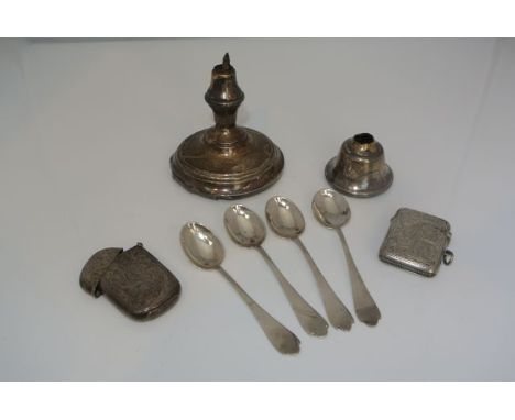 A late Victorian silver vesta case, Chester, probably 1899, of shaped rectangular form, flat-chased with scrolling leaves and