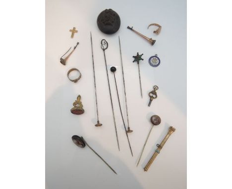 A collection of four late 19th/early 20th century hat pins, two with Art Nouveau mother-of-pearl terminals; a 19th century bo