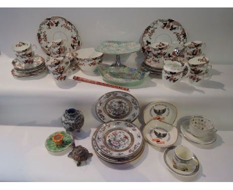 A quantity of late 19th century tea wares with printed and infilled floral decoration comprising a pair of cake plates, milk 