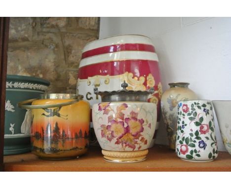 A collection of 19th century and other ceramics including a biscuit barrel with printed and infilled floral decoration with p