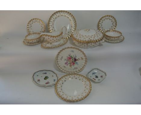 An extensive collection of Spode dinner wares with gilt Fleur De Lys border decoration comprising a pair of covered two handl