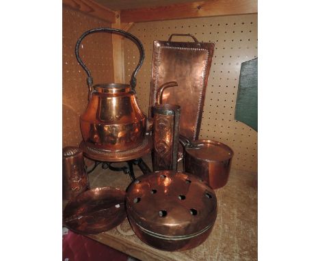 A collection of copper ware including an Art Nouveau hammered copper flagon with steel banded borders and handle, a 19th cent