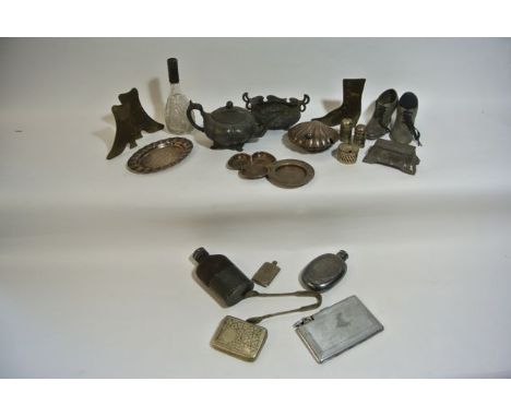 A selection of silver plated and other metal wares to include a  pair of pincushions in the form of Edwardian ladies boots, a