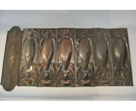 Seven late 19th/early 20th century embossed door plates with decoration loosely in the Art Nouveau manner