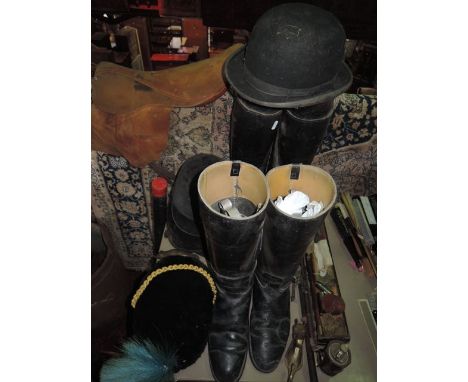 A hunting related collection including two pairs of riding boots, riding hat, fox mask, door knocker, riding crop, etc