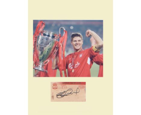 Steven Gerrard. Signed match ticket against Lazio mounted with picture playing for Liverpool. Professionally mounted to 16 x 
