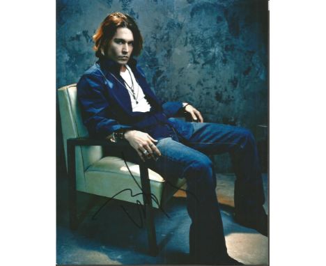 Johnny Depp signed 10x8 colour photo.  American actor, producer, and musician. He has been nominated for 3 Academy Awards and