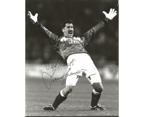 Football David Seaman 10x8 signed b/w photo in action for Arsenal. David Andrew Seaman, MBE (born 19 September 1963) is an En