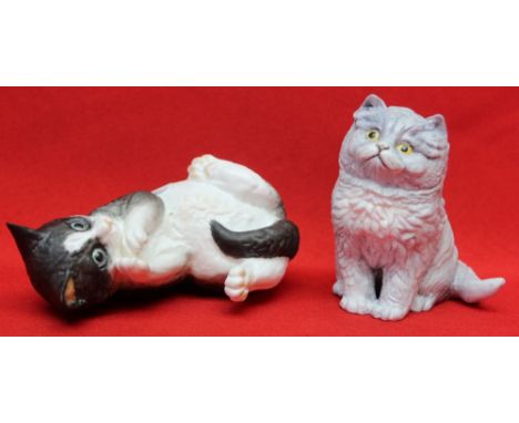 Two "Royal Worcester" ceramic kittens, a "Black and White" and a "Blue Prussian" (2)