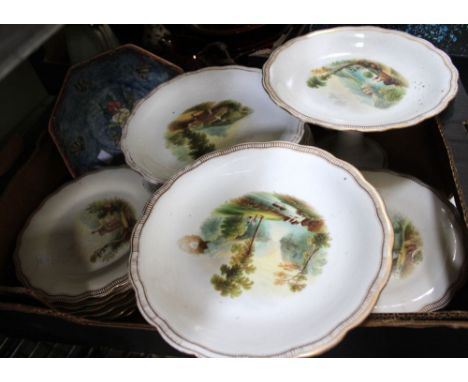 A Victorian ceramic part dessert service, each piece with a different hand painted landscape, each titled in red script to th
