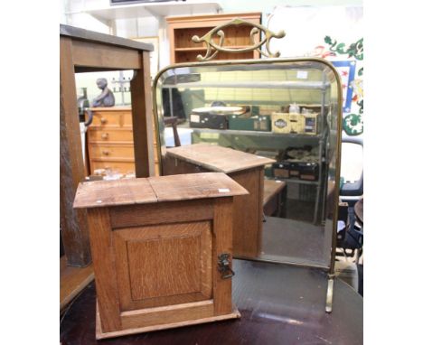 A brass framed firescreen inset bevel mirror glass panel together with a small oak cupboard (2)
