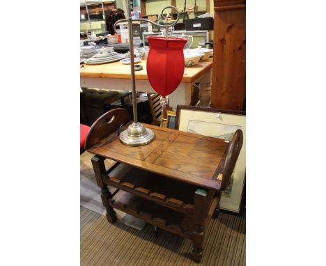 An oak table with Butlers tray removable top, fitted undertiers, together with a table lamp fitted shade (2)