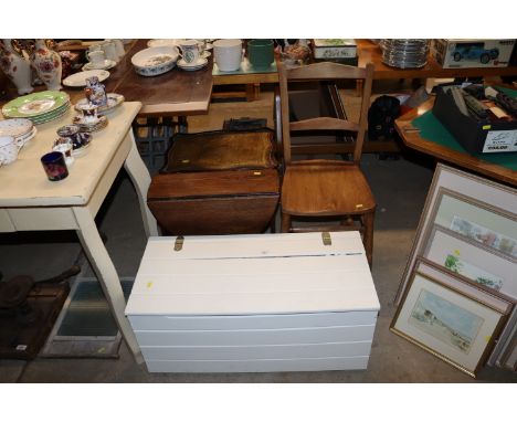 A painted trunk; an oak drop leaf coffee table; an elm seated chair and a leather topped coffee table 