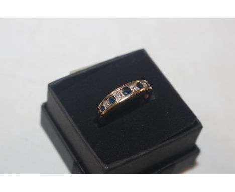 A 9ct gold sapphire and chip diamond set ring, ring size M approx. 2g total weight