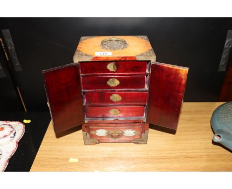 A Chinese wood and brass mounted hardstone inlaid table trinket cabinet 