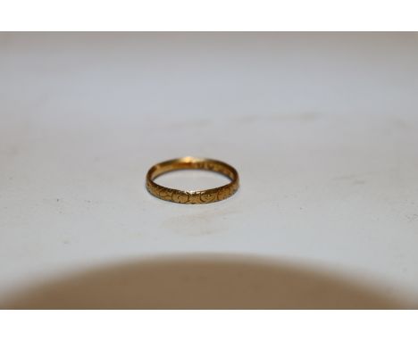 An 18ct gold wedding band, ring size M/N, approx. 2gms