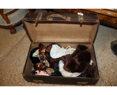 A suitcase of vintage hats and two French velvet handbags