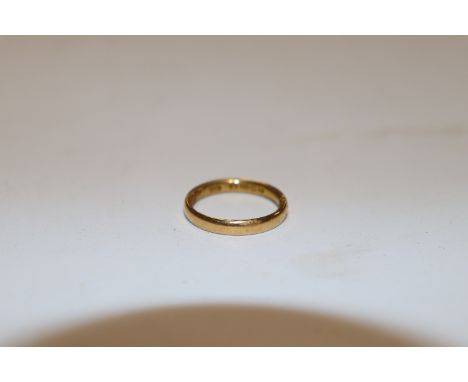 A 22ct gold wedding band, ring size M, approx. 3.5gms