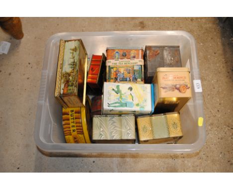 A box of various vintage tins