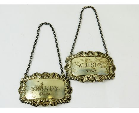 Matched pair of Hallmarked Silver Decanter Collars with chains. Combined weight 26.8g  See photos. 