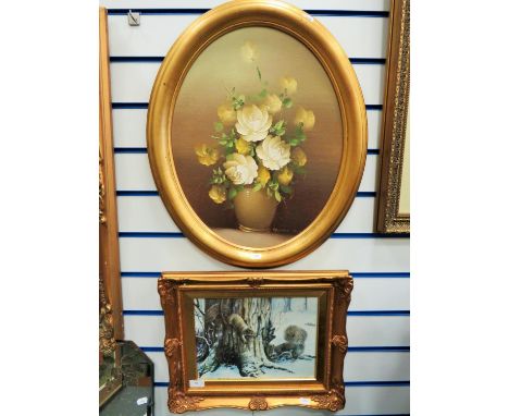 Nicely painted still life of a Vase of Roses, Bears the signature Robert Cox. Set in an Oval  gilt frame which measures appro