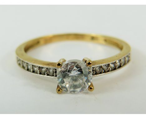 9ct Yellow gold CZ set ring.
