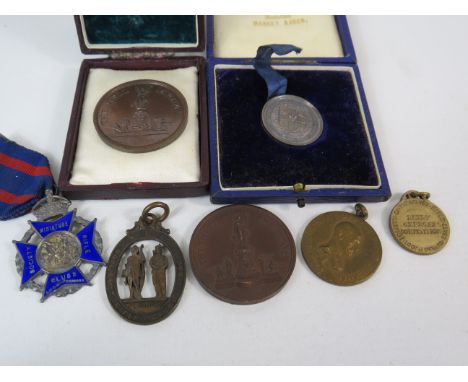 7 Rifle club tokens/ medals , one is sterling silver.