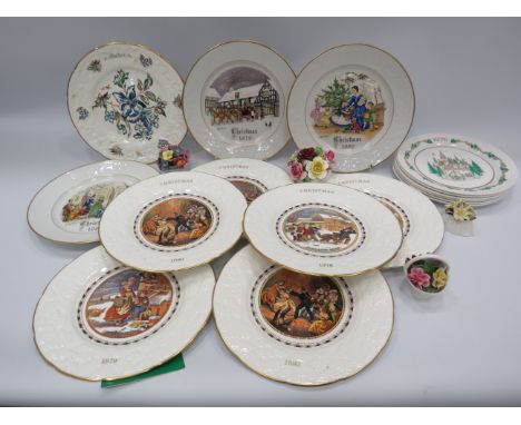 16 Christmas plates by Royal Worcester, Spode, etc and 4 china posies.