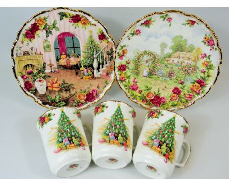 Three Mugs By Royal Albert in the Old Country Roses Christmas Magic pattern plus one decorative 8.5inch plate together with a
