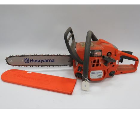 Husqvarna petrol engined Chainsaw. Believed to be in good running order. See photos. 