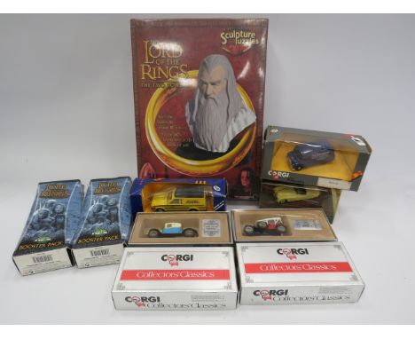 5 Corgi diecast vehicles, Lord of the rings puzzle still in cellophane and 2 mini games.