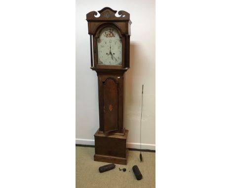 A 19th Century oak cased long case clock, the eight day movement with white enamelled dial and painted decoration of floral s