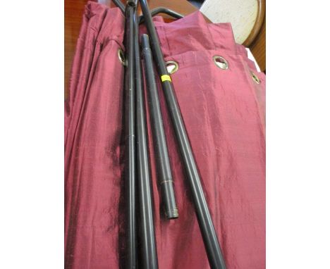 A pair of burgundy taffeta ring top curtains measuring 112"width x 90" drop per curtain, together with a metal clothes rail, 