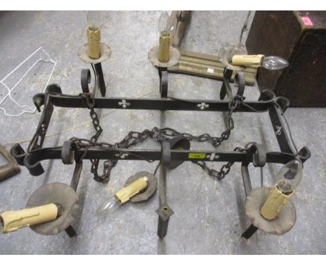A gothic style wrought iron ceiling hanging, six branch light 