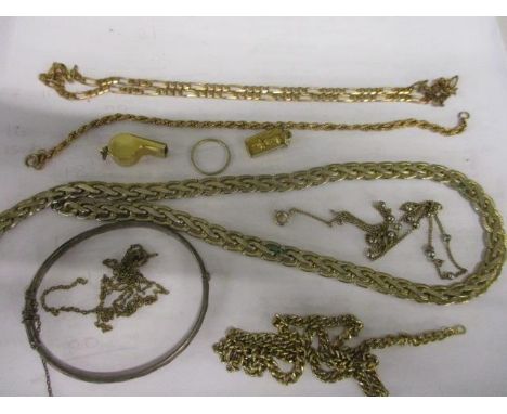 A 9ct gold necklace, a 9ct gold bracelet, a silver bangle and mixed yellow metal chains (total gold weight 20.9g) 