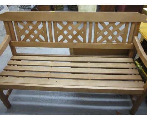 A Robert Dyas teak garden bench 