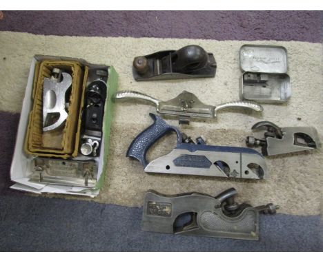 A group of woodworking planes and tools to include a Stanley No.68 rabbit Spokeshave, a Record No.73 rebate plane, a Record N