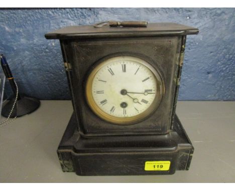 A Victorian black slate and variegated marble mantel clock with white enamel Arabic dial (with key) 