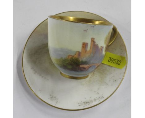 A Royal Worcester miniature cabinet cup and saucer, decorated with a view of a castle, the saucer signed Ruston, the saucer U