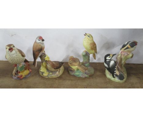 Three Royal Worcester double bird models and a single model