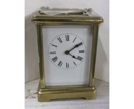 A brass cased carriage clock