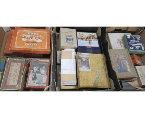 Three boxes of assorted vintage jigsaws