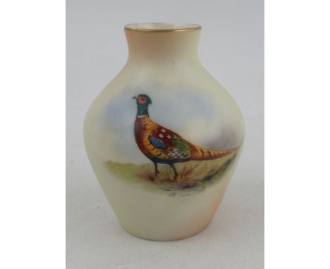 A Locke and Co Worcester blush ivory vase, decorated with a cock pheasant, height 3.25insCondition Report:  Good condition, n