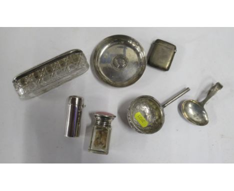 A collection of silver items, to include dressing table bottles and jars, scent bottle, toddy ladle etc