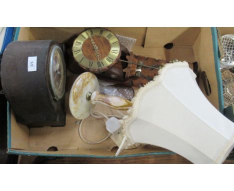 A box of silver plated items, together with two clocks and a table lamp and a box of assorted items
