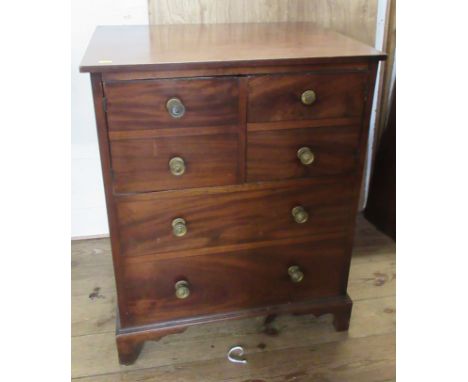 A 19th century mahogany commode cabinet, fitted with a lift lid and cupboard doors, 25.5ins x 18.5ins, height 32ins