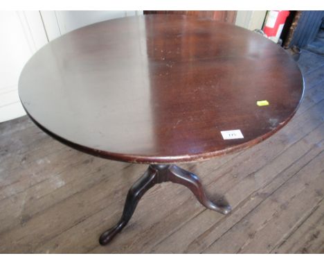 A Georgian style circular occasional table raised on a tripod base with part wrythm&nbsp; column width 30ins, height 27.5ins&