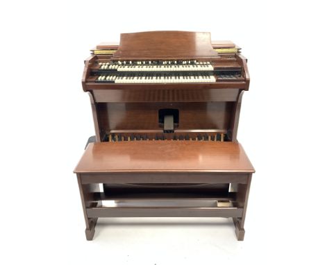 20th century electric church organ by Hammond, in walnut case, Model no. RT3 serial no. 8840 (W140cm) with bench (W116cm) and