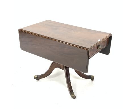 Regency mahogany supper table, the moulded top with drop leaves over drawer to one end, raised on turned pedestal and four sp