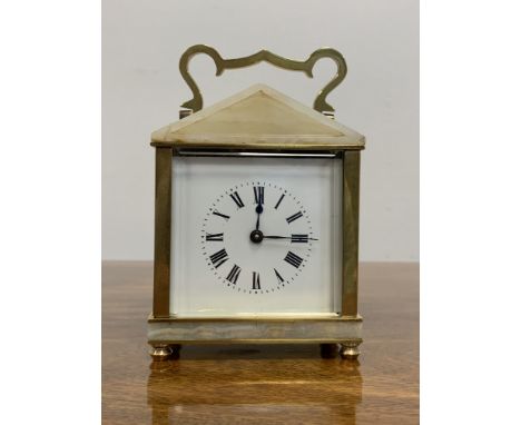 20th century brass and onyx cased mechanical carriage clock, white enamel dial with Roman numeral chapter ring and blued stee